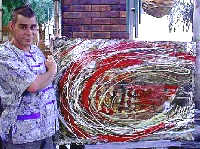 Andrew Jack with the painting he has donated to AIAA